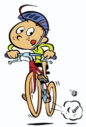 Boy sticking out tongue while cycling