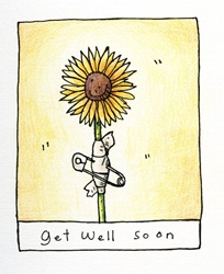 Sunflower in bandage and safety pin