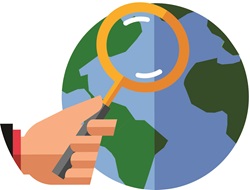 Person holding magnifying glass in front of globe