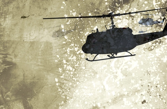 Silhouette of helicopter against wall