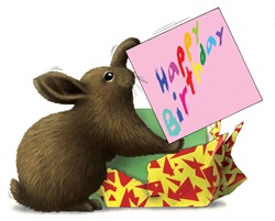 Rabbit holding birthday card