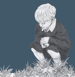 Boy with stone looking at grass