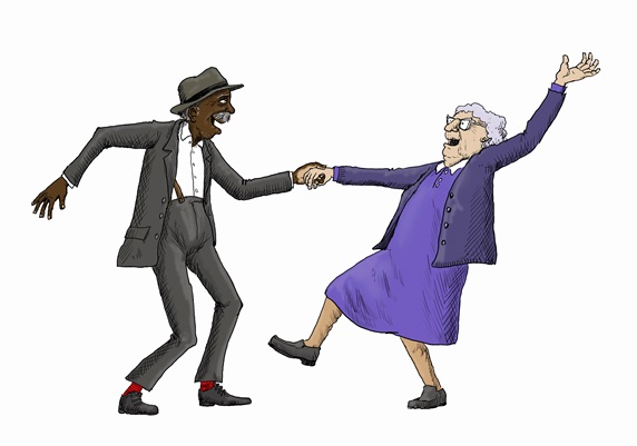 Elderly couple having fun jive dancing