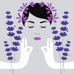 Woman meditating with lavender aromatherapy