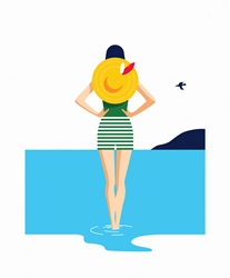 Woman at seaside paddling in water