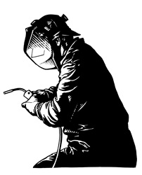Welder wearing mask and holding welding torch