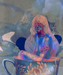 Woman sitting in tea cup