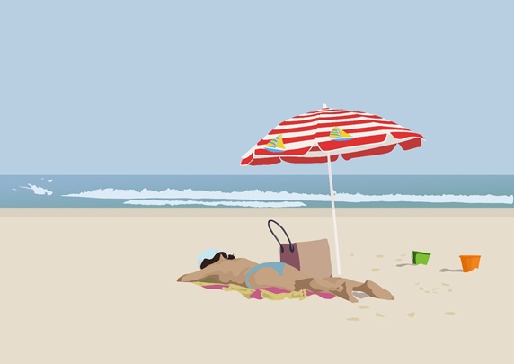 Woman sunbathing on sandy beach