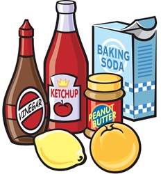 Bottles of vinegar and ketchup, peanut butter, baking soda box and lemon