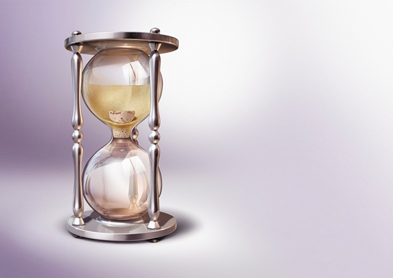 Stopping sands of time in hourglass with cork