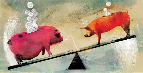 Piggy banks balancing on seesaw