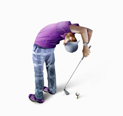 Golfer bending over backwards teeing off