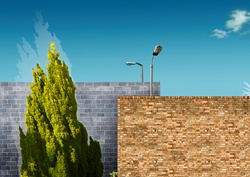 Barrier of two brick walls with street lamps