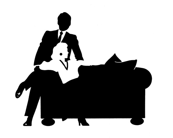 Mid adult couple sitting on sofa