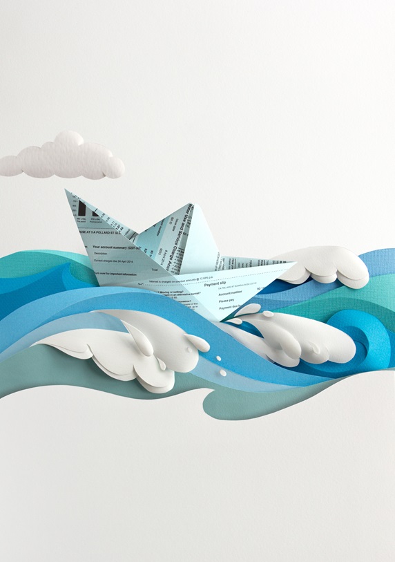 Paper boat on wavy sea