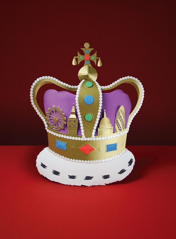 Paper crown on red background