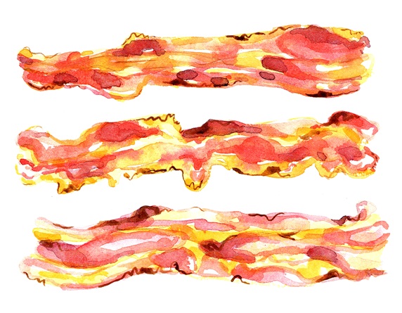 Three bacon strips on white background