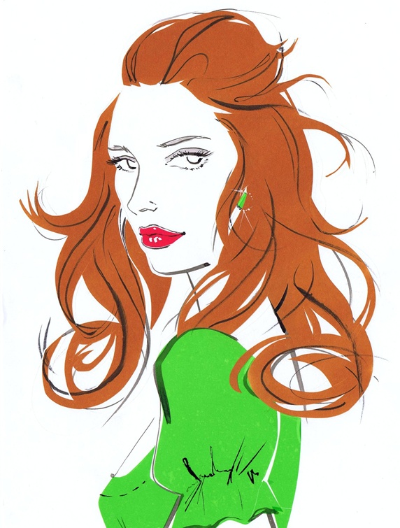 Portrait of redhead woman in green blouse