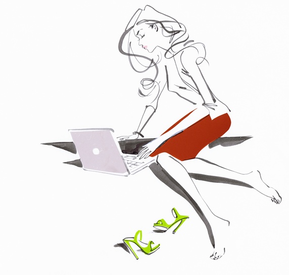 Beautiful businesswoman using laptop computer sitting barefoot on ground