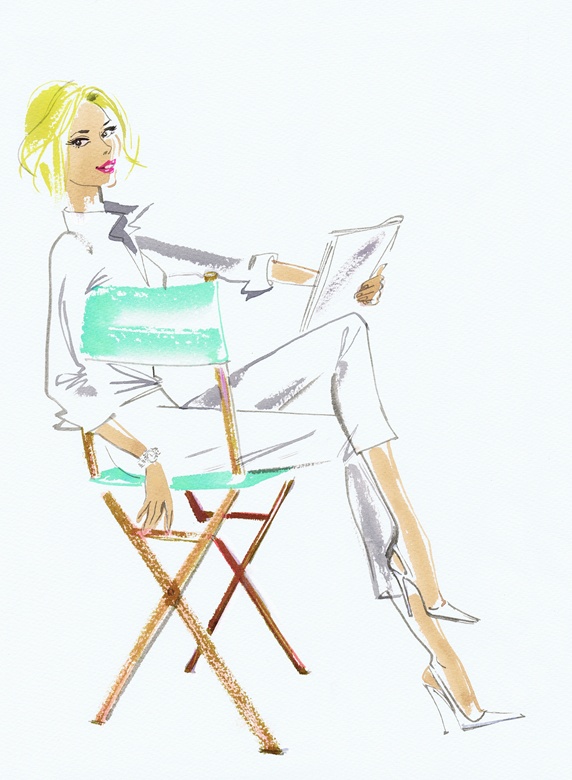 Elegant woman reading script in director's chair