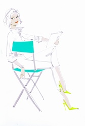 Elegant woman reading script in director's chair