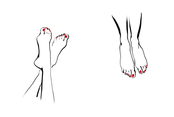 Women's feet with red nail polish