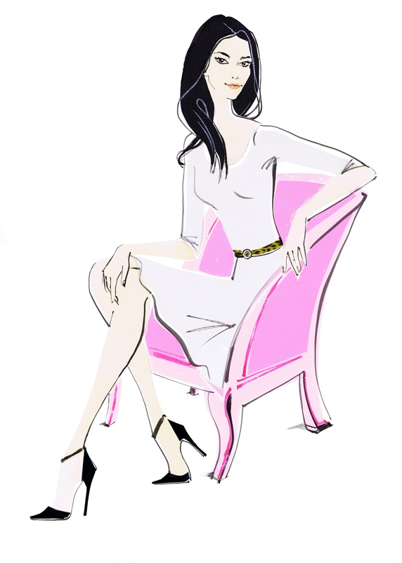 Portrait of elegant woman sitting in pink armchair
