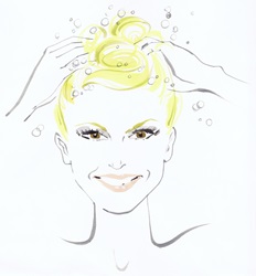 Portrait of smiling woman washing hair