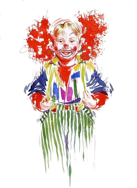 Portrait of boy in clown's costume