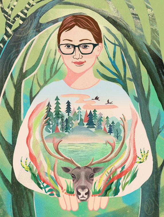 Portrait of woman holding landscape