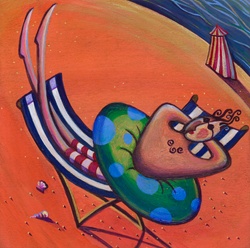 Man with feet up sunbathing on beach lounger