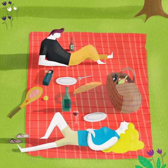 Man and woman relaxing at picnic