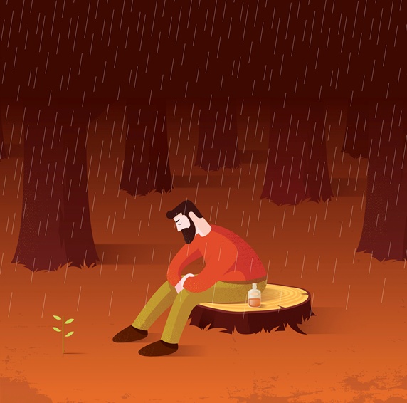 New leaves growing as sign of hope to depressed man sitting alone on tree stump in rain