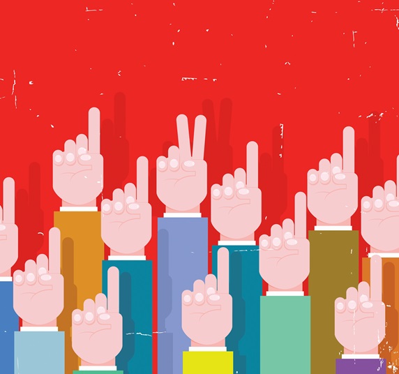 Businessman's hand making victory sign standing out from the crowd of raised hands