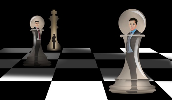 Office workers inside chess pieces