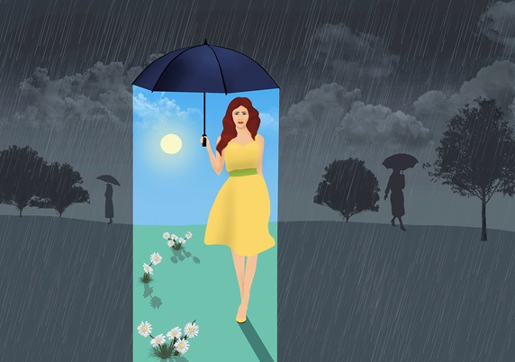 Woman with bright weather under umbrella on rainy day