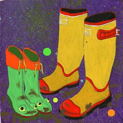 Child's frog wellington boots next to adult pair