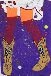 Girl's legs wearing funky cowboy boots and stripy socks