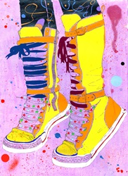 Yellow boots with colorful laces