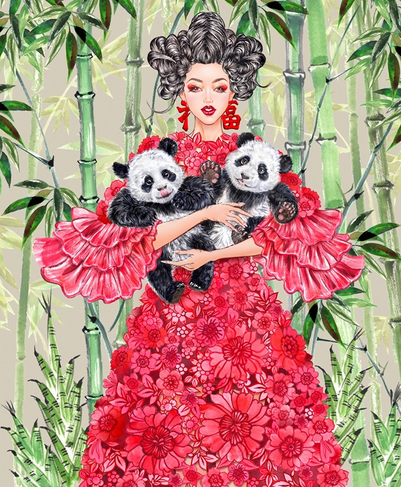 Fashion model in floral dress posing with panda cubs