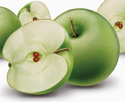 Close up of whole and halved green apples