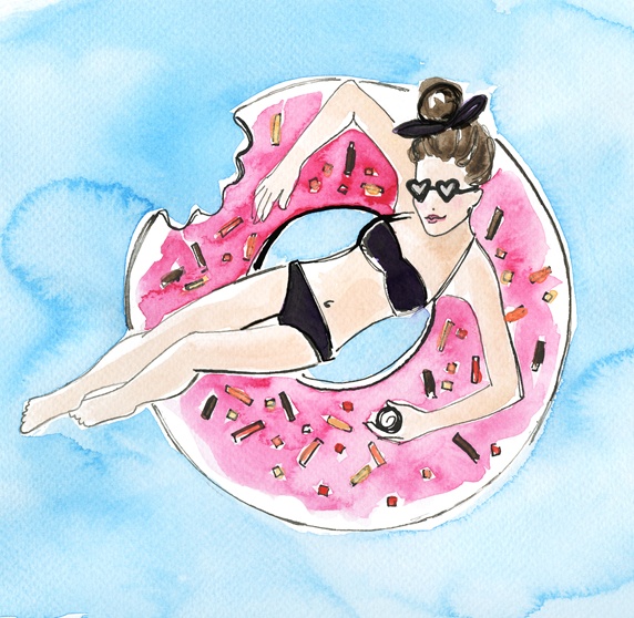 Woman floating on inflatable donut