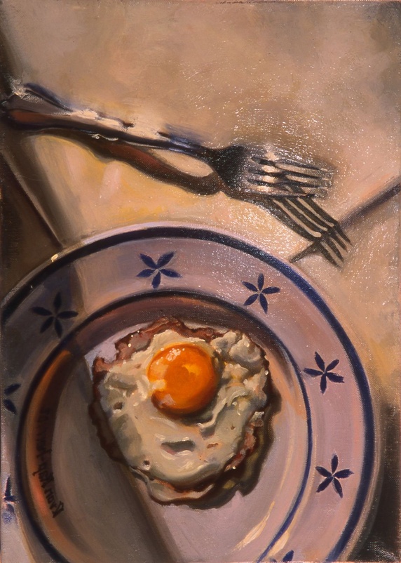 Overhead view of fried egg on plate
