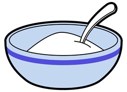 Sugar in bowl with spoon